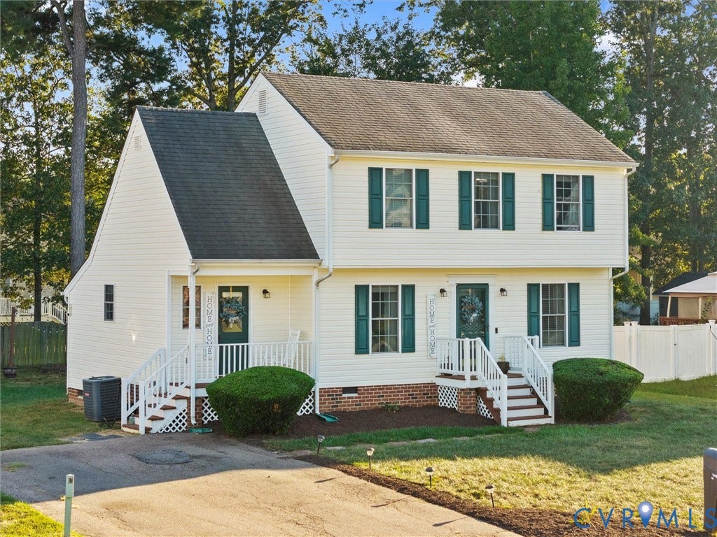 6507 Fairpines Road, North Chesterfield, VA 23234 White siding exterior with dark green shutters