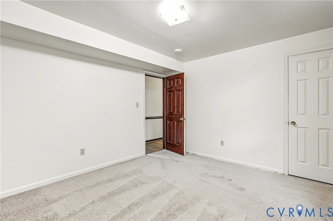 13310 Gladehill Road, Hidden Valley Estates, Chesterfield, VA 23831 Carpeted flooring, white walls, and a wood-finish door