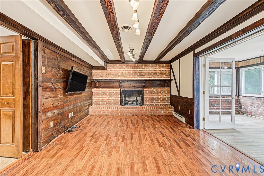 13310 Gladehill Road, Hidden Valley Estates, Chesterfield, VA 23831 Exposed wood beam ceiling with recessed lighting, brick fireplace with wood mantel, wood-finish flooring, wood paneling, and French doors