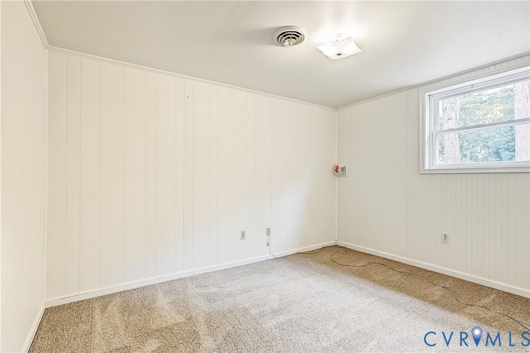 13310 Gladehill Road, Hidden Valley Estates, Chesterfield, VA 23831 Carpeted flooring, white paneled walls, white trim, single window, and a ceiling light fixture