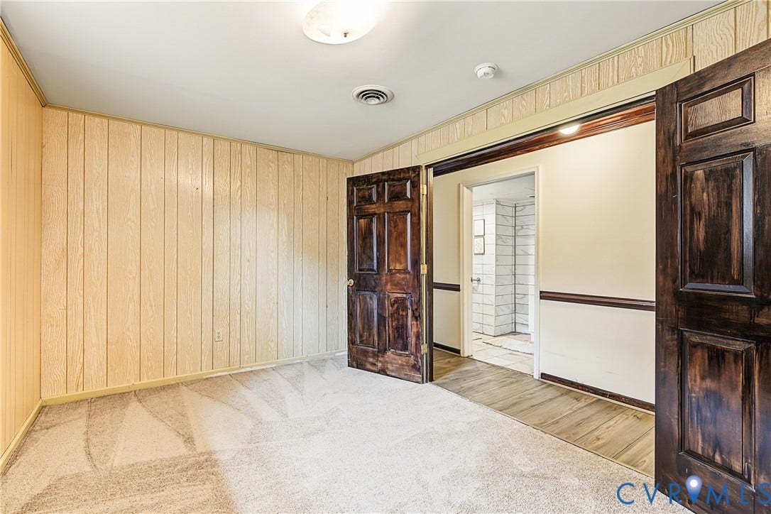 13310 Gladehill Road, Hidden Valley Estates, Chesterfield, VA 23831 Light-toned wood paneling walls with contrasting dark wood doors and trim