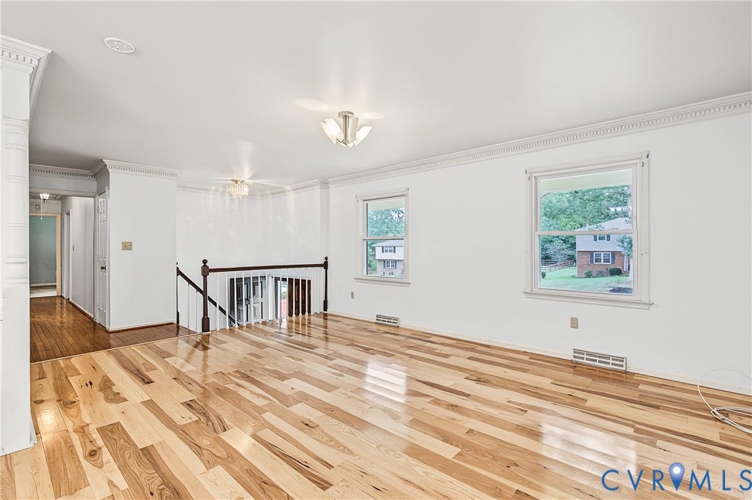 13310 Gladehill Road, Hidden Valley Estates, Chesterfield, VA 23831 Hardwood flooring, decorative crown molding, recessed lighting, ceiling light fixture, and a wood banister