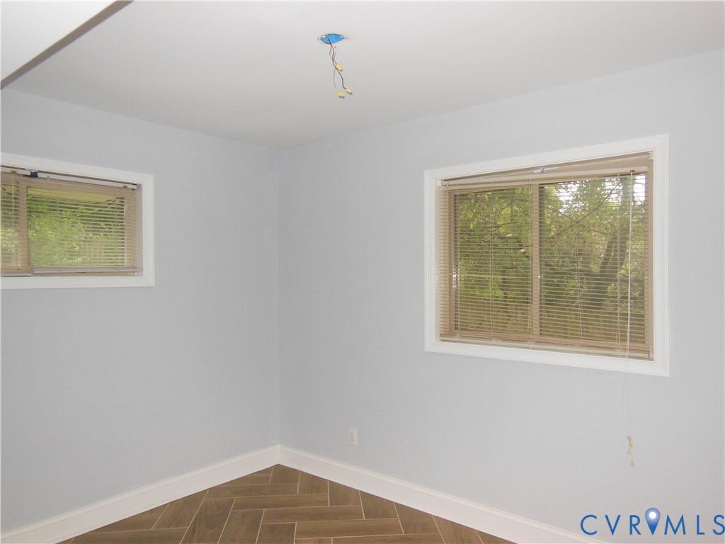 Could easily be turned into a 4th Bedroom by adding closet door