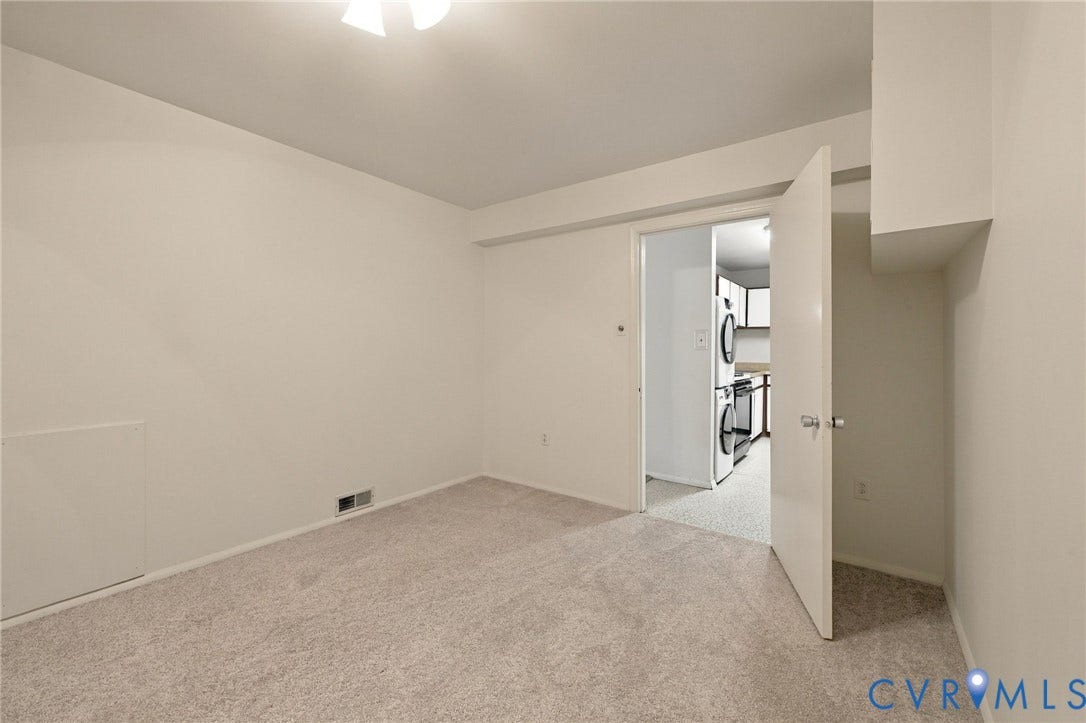 12 Snughaven Road, Hamlet, Henrico, VA 23228 Carpeted flooring, white walls, overhead lighting, and a white interior door