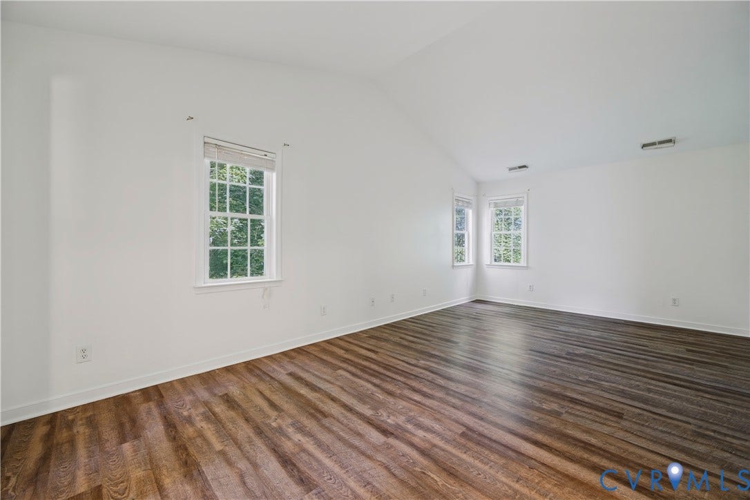 15724 Winding Ash Drive, Chesterfield, VA 23832 Vaulted ceiling, wood-finish flooring, white walls, multiple windows, window blinds