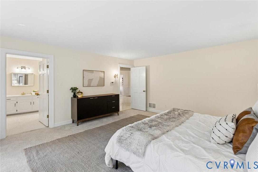Carpeted flooring throughout, with a neutral wall color