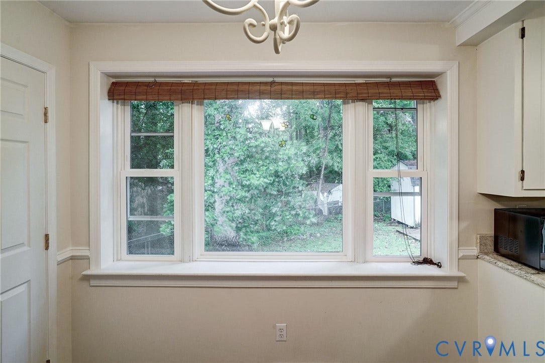 2602 Seacliff Court, Richmond, VA 23236 Triple window unit with white trim and a deep sill