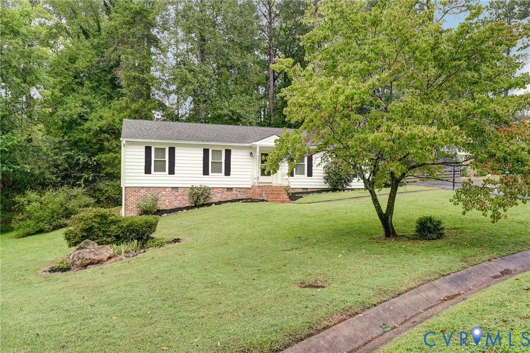 2602 Seacliff Court, Richmond, VA 23236 White siding exterior with brick foundation