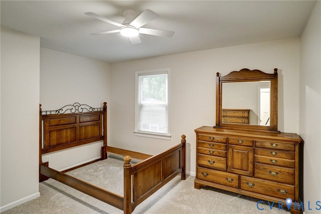 2602 Seacliff Court, Richmond, VA 23236 Neutral wall color, window with natural light, recessed lighting, and carpeted flooring