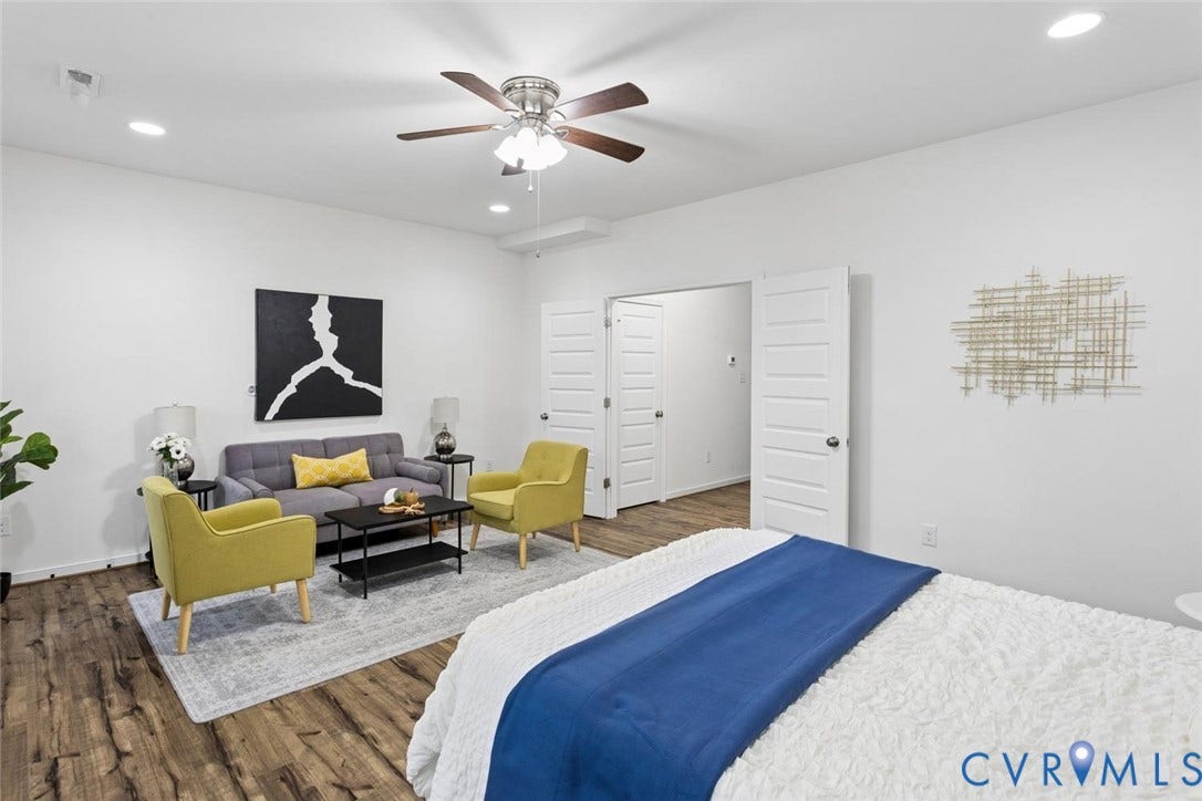 10420 Perennial Drive, Ridgefield Green Townhome, Henrico, VA 23233 Wood-finish flooring, recessed lighting, ceiling fan, and white paneled doors