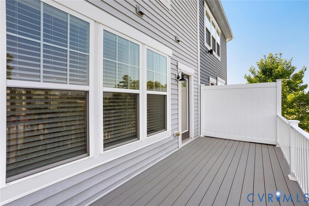 10420 Perennial Drive, Ridgefield Green Townhome, Henrico, VA 23233 Expansive outdoor deck with composite decking, white privacy panel, and white railing