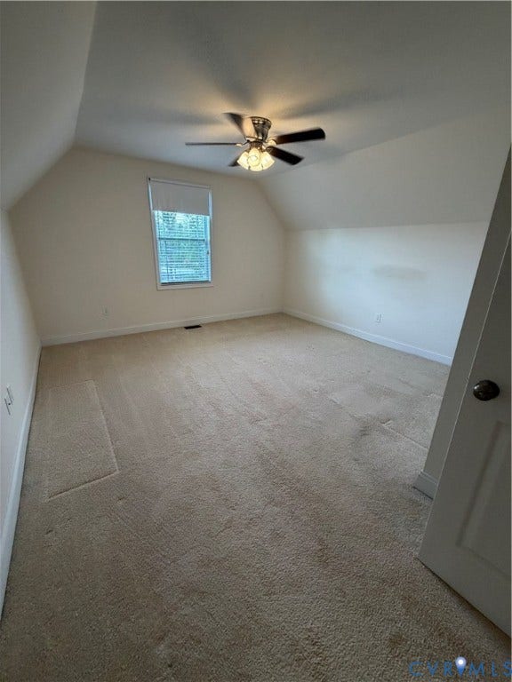 12146 Elnora Lane, Glen Allen, VA 23059 Sloped ceilings, neutral wall tones, window with roller shade, ceiling fan with integrated lighting, and neutral carpet flooring