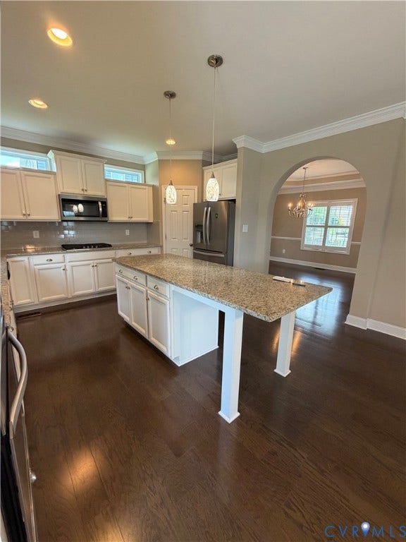 12146 Elnora Lane, Glen Allen, VA 23059 Kitchen featuring white cabinetry, a large center island with a stone-finish countertop, stainless steel appliances, and dark wood-finish flooring