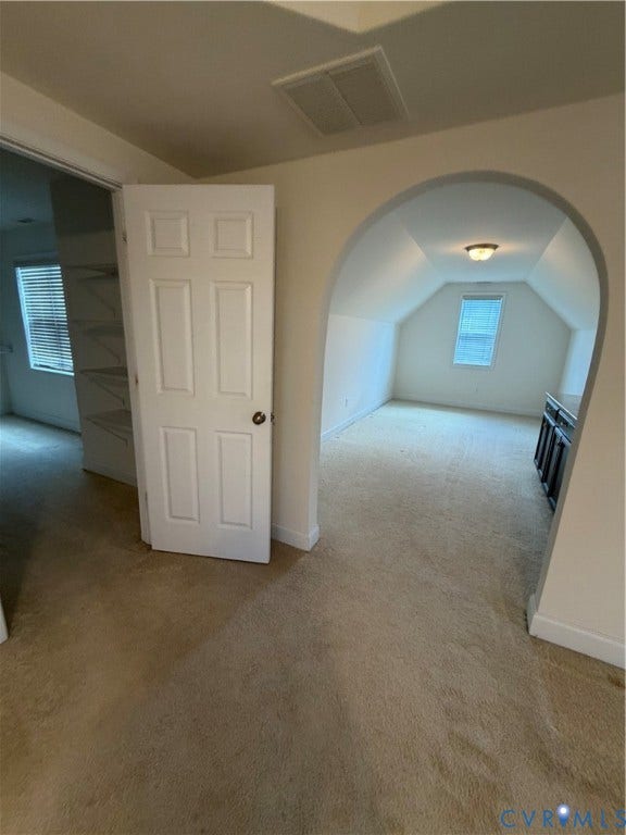 12146 Elnora Lane, Glen Allen, VA 23059 Carpeted interior with an arched entryway