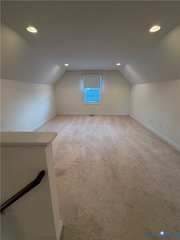12146 Elnora Lane, Glen Allen, VA 23059 Spacious room featuring vaulted ceilings, recessed lighting, neutral carpeting, and a single window with blinds