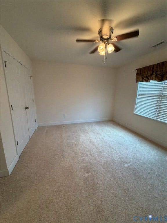 12146 Elnora Lane, Glen Allen, VA 23059 Wall-to-wall carpeting with light-toned walls, ceiling fan with light fixture, and window with blinds