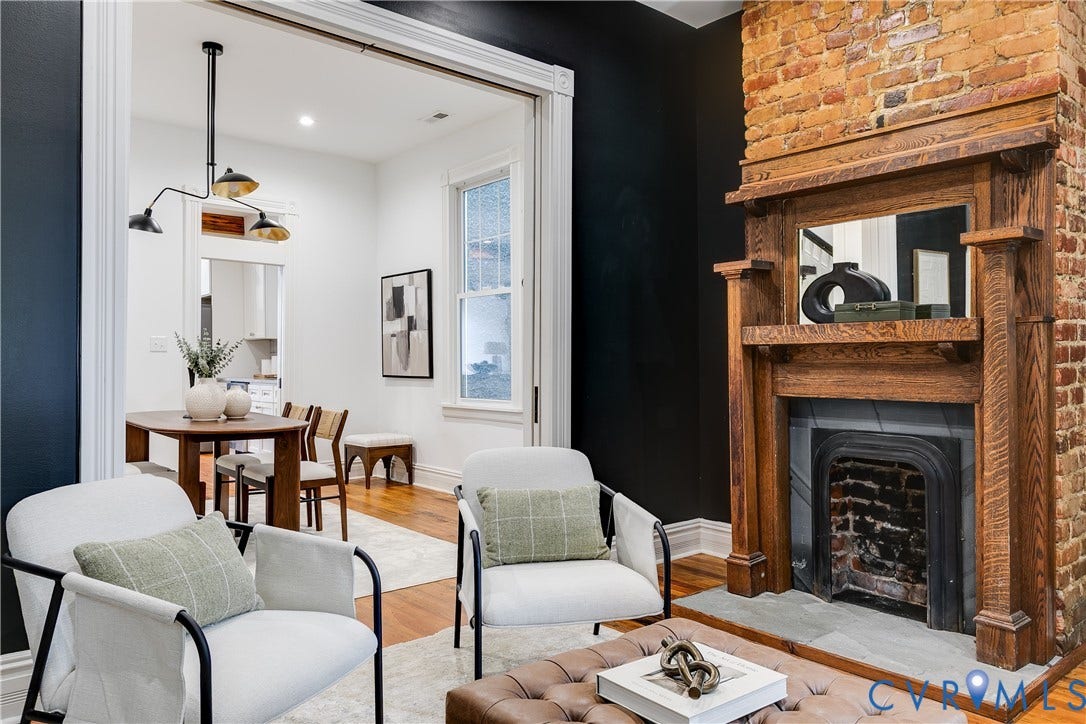 1416 Oakwood Avenue, Church Hill, Richmond, VA 23223 Exposed brick fireplace with a wood-finish mantel and hearth