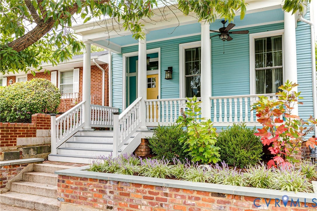 1416 Oakwood Avenue, Church Hill, Richmond, VA 23223 Classic front porch with white columns, light blue siding, and a ceiling fan