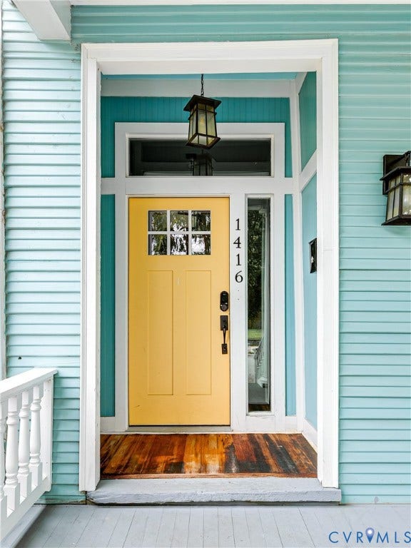 1416 Oakwood Avenue, Church Hill, Richmond, VA 23223 Vibrant yellow entry door with divided lites, transom window, and a sidelite