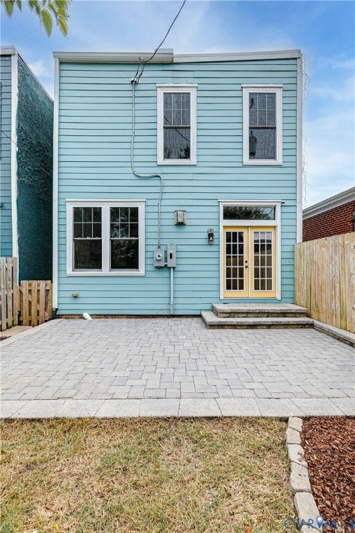 1416 Oakwood Avenue, Church Hill, Richmond, VA 23223 Blue siding exterior with multiple windows