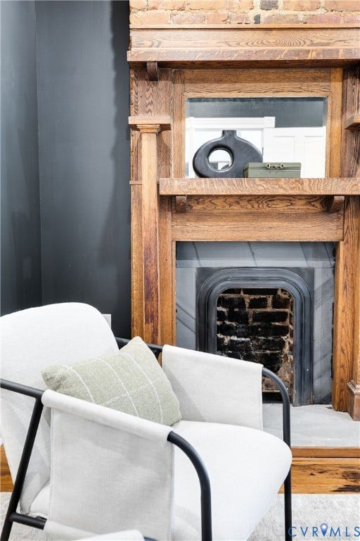 1416 Oakwood Avenue, Church Hill, Richmond, VA 23223 Ornate wood-carved fireplace mantel with a mirrored overmantel