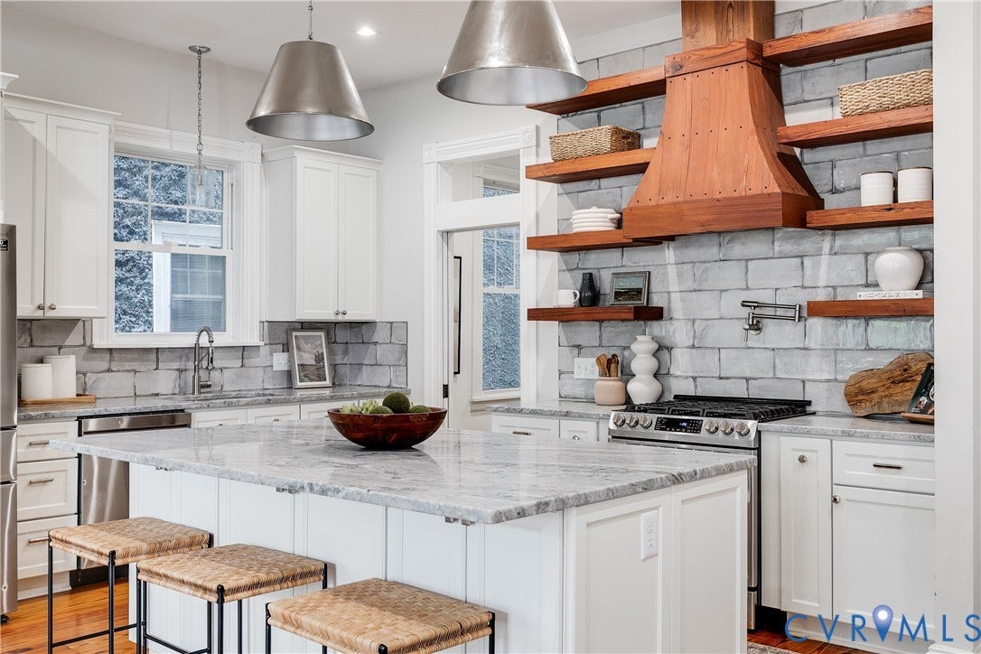 1416 Oakwood Avenue, Church Hill, Richmond, VA 23223 Kitchen featuring white cabinetry, a central island with a stone countertop, a tile backsplash, and wood-finish open shelving with an integrated range hood