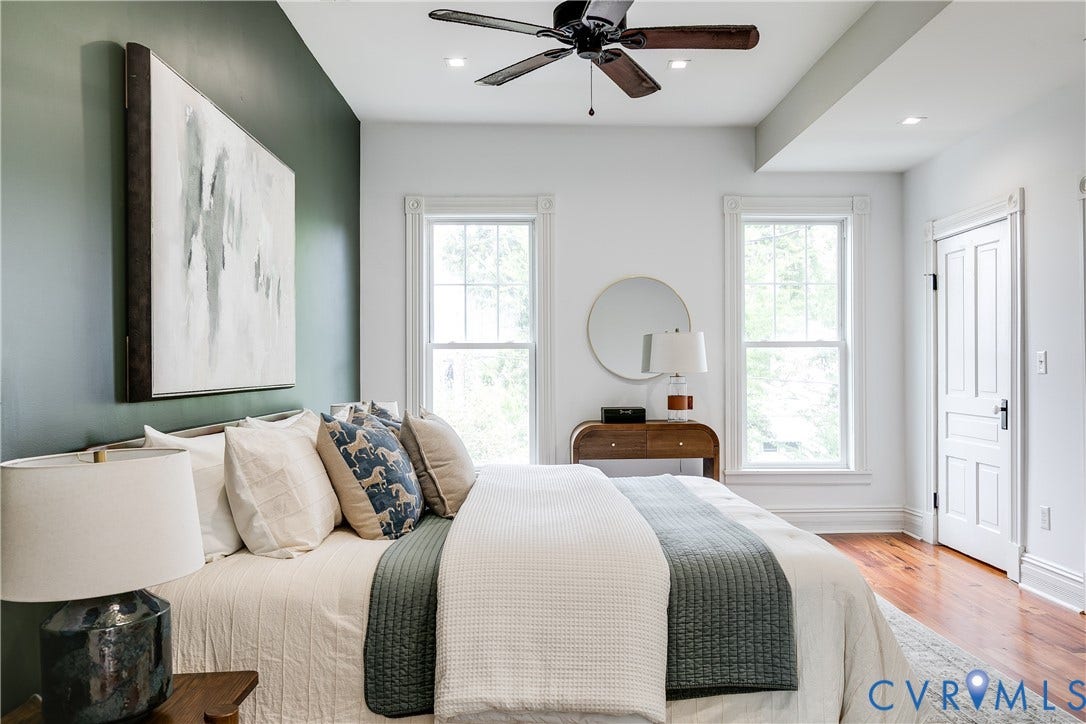 1416 Oakwood Avenue, Church Hill, Richmond, VA 23223 Hardwood flooring, recessed lighting, ceiling fan, white paneled door, and trimmed windows