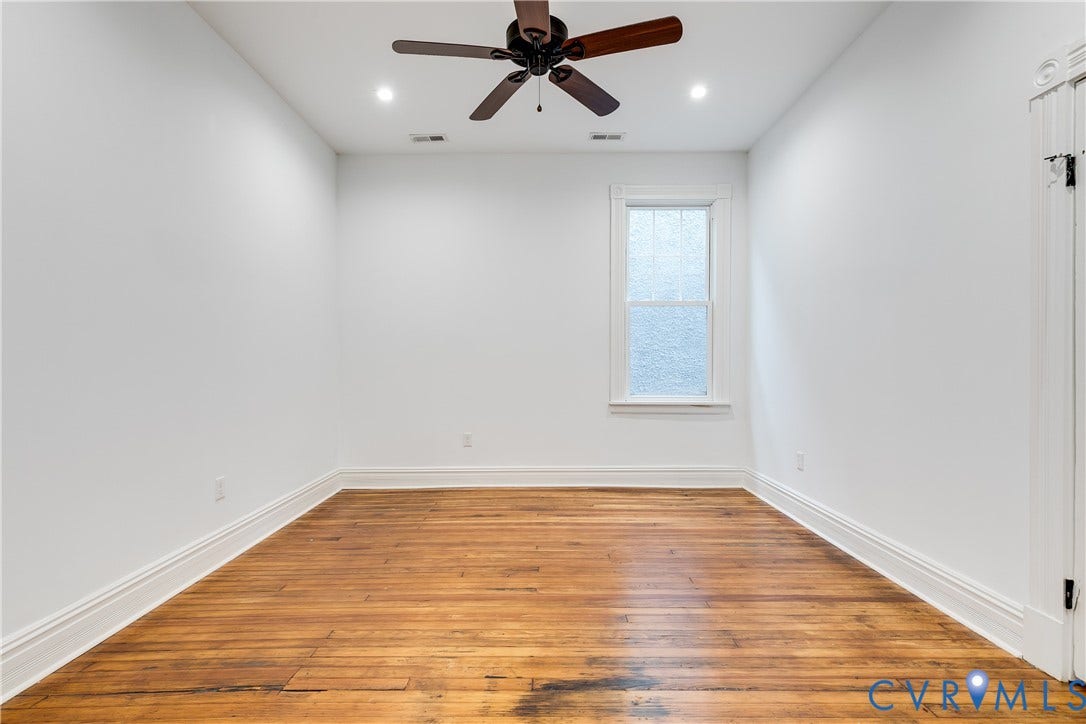 1416 Oakwood Avenue, Church Hill, Richmond, VA 23223 Hardwood flooring, white walls, single window with frosted glass, ceiling fan, recessed lighting