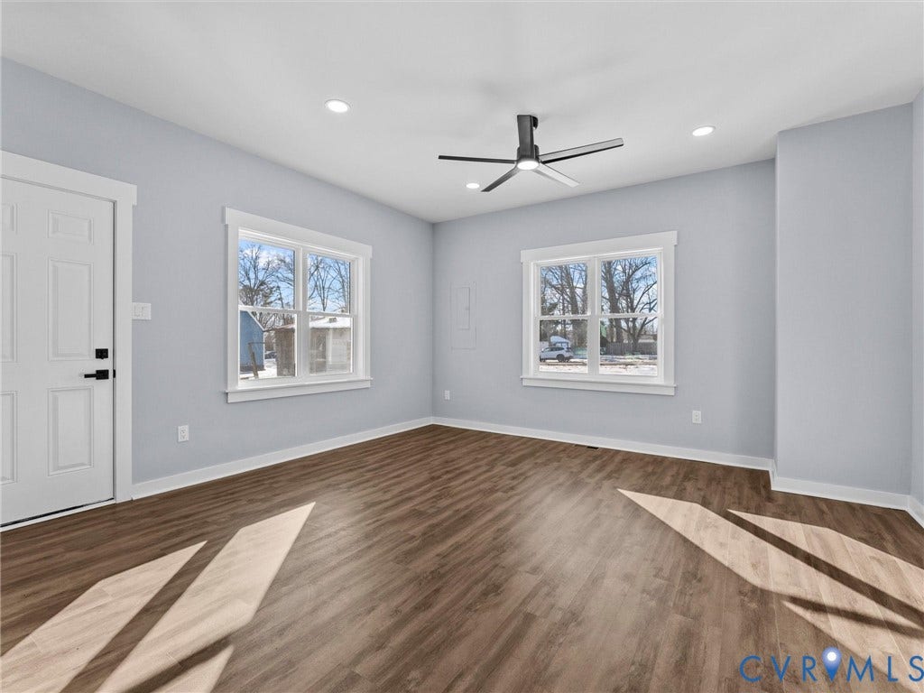 2719 General Boulevard, Chesterfield, VA 23237 Wood-finish flooring throughout, complemented by two large windows with white trim