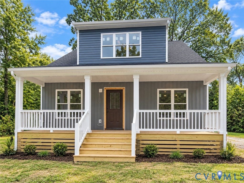 2719 General Boulevard, Chesterfield, VA 23237 Two-story exterior with a covered porch, white railing, and wood-finish steps