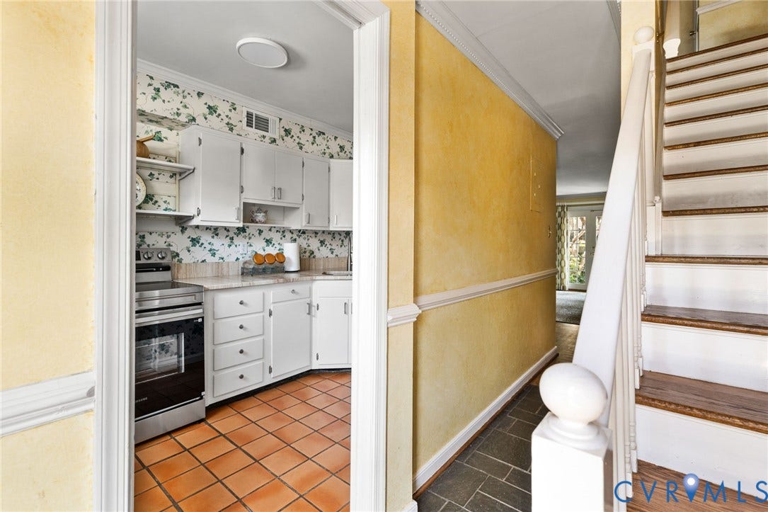 505 N Hamilton Street, #F, Richmond, VA 23221 Kitchen featuring white cabinetry, light-colored countertops, stainless steel range, and terracotta tile flooring