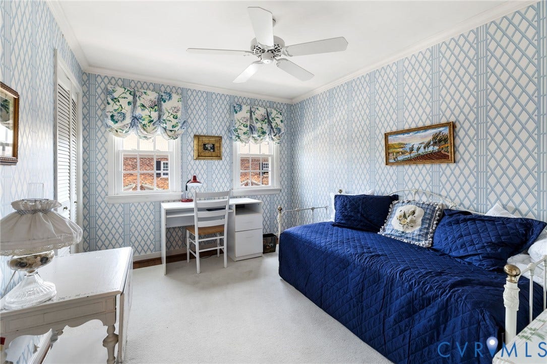 505 N Hamilton Street, #F, Richmond, VA 23221 Patterned wall covering, ceiling fan, two windows, built-in desk, and white trim