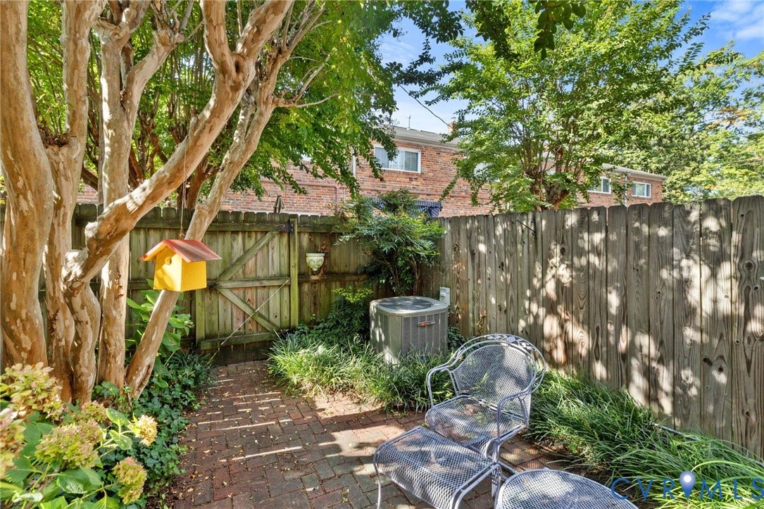 505 N Hamilton Street, #F, Richmond, VA 23221 Private brick patio with wood fence and mature trees
