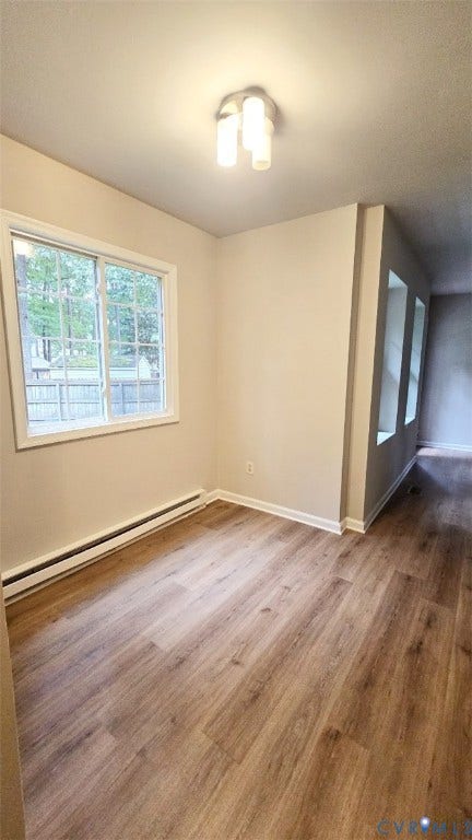 3807 Mooring Way, Chester, VA 23831 Wood-finish flooring, white trim, and a contemporary ceiling light fixture