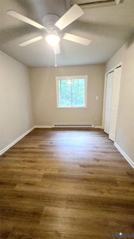 3807 Mooring Way, Chester, VA 23831 Wood-finish flooring, white ceiling fan, white trim, and bi-fold closet doors