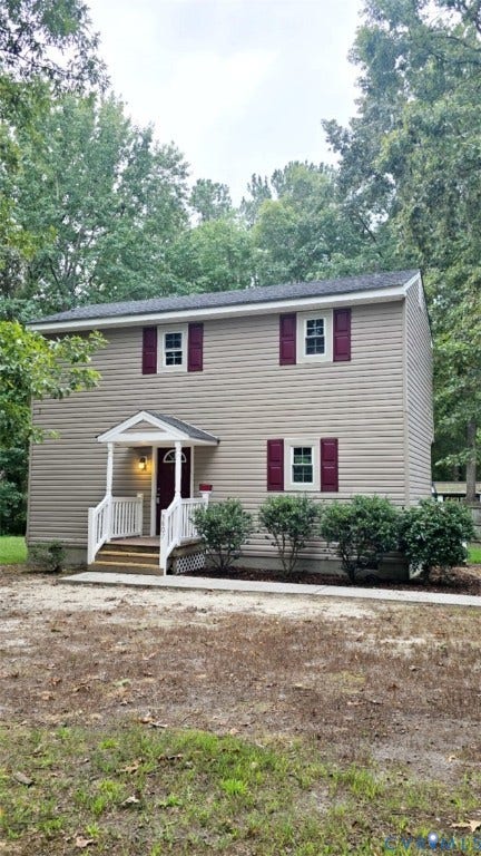 3807 Mooring Way, Chester, VA 23831 Two-story exterior with horizontal siding, covered front porch, white railings, and red window shutters