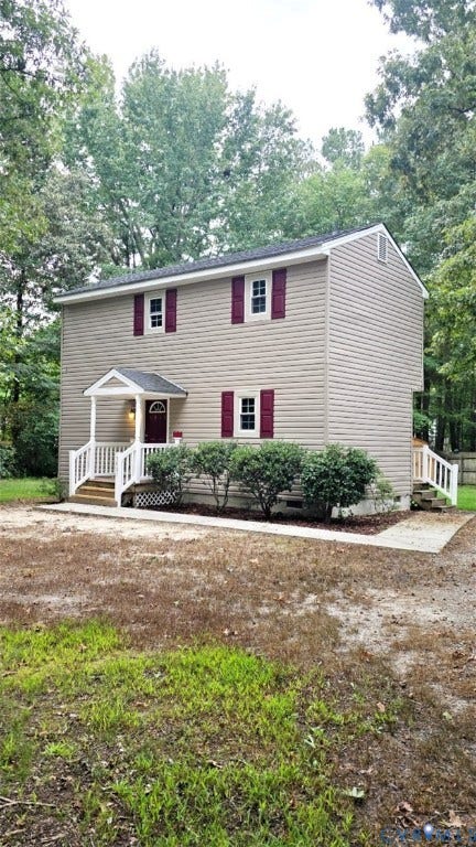 3807 Mooring Way, Chester, VA 23831 Two-story residence featuring light-colored siding, dark shutters, and a covered entry porch