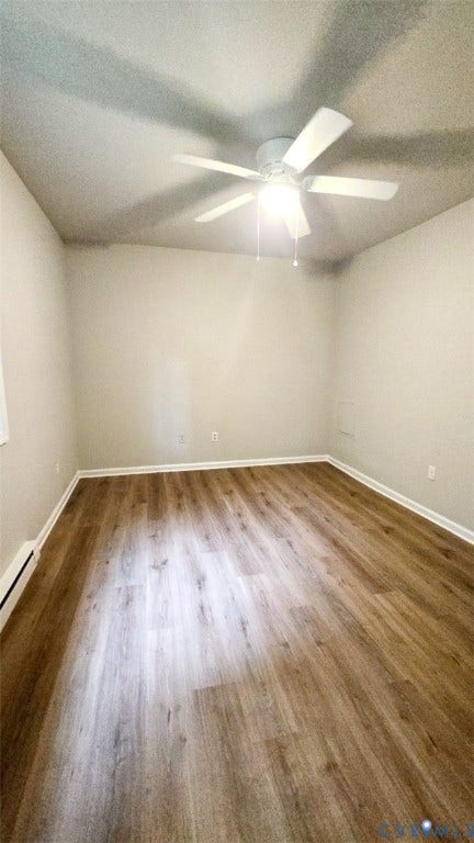 3807 Mooring Way, Chester, VA 23831 Wood-finish flooring, white walls, white ceiling fan, and white baseboards