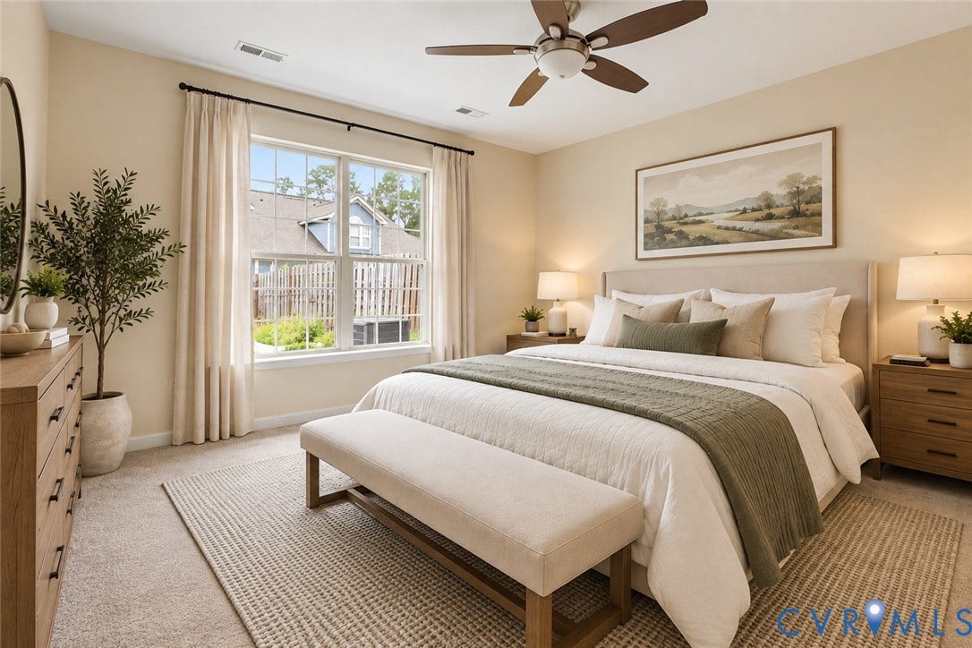 508 Winterhawk Place, Glen Allen, VA 23059 Expansive window, plush carpet, and a ceiling fan with integrated lighting. Photo virtually staged