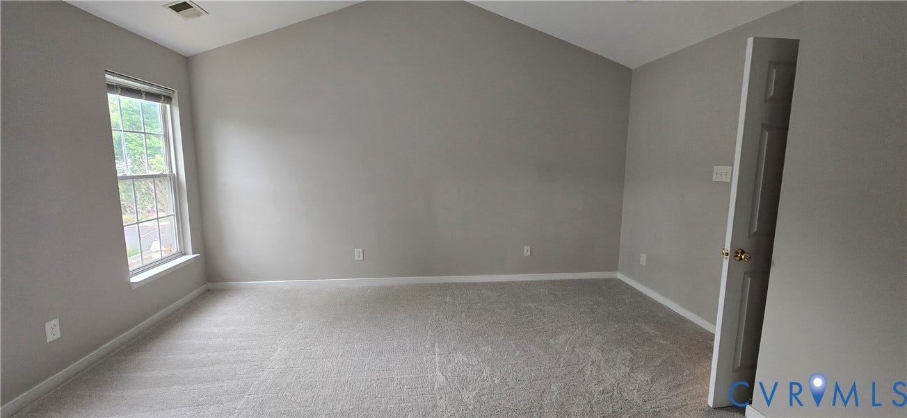 5506 Millwheel Lane, Henrico, VA 23228 Vaulted ceiling accentuates the spacious room