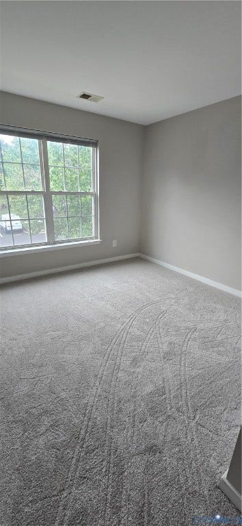 5506 Millwheel Lane, Henrico, VA 23228 Neutral wall paint, plush carpeting, multiple windows with natural light, and white trim molding