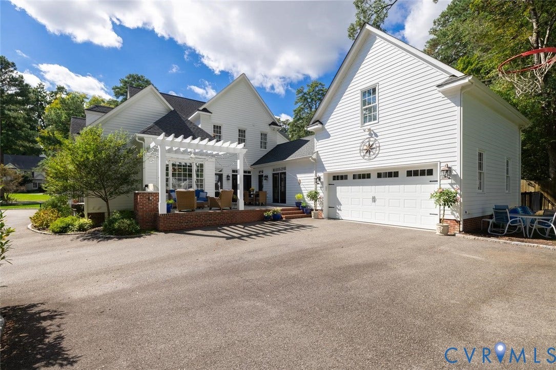 2 car garage, patio and large driveway
