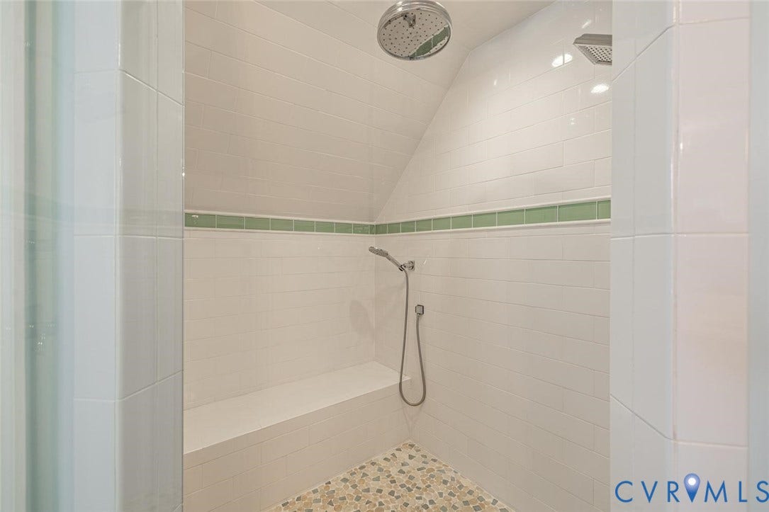 Bench seating and three shower heads