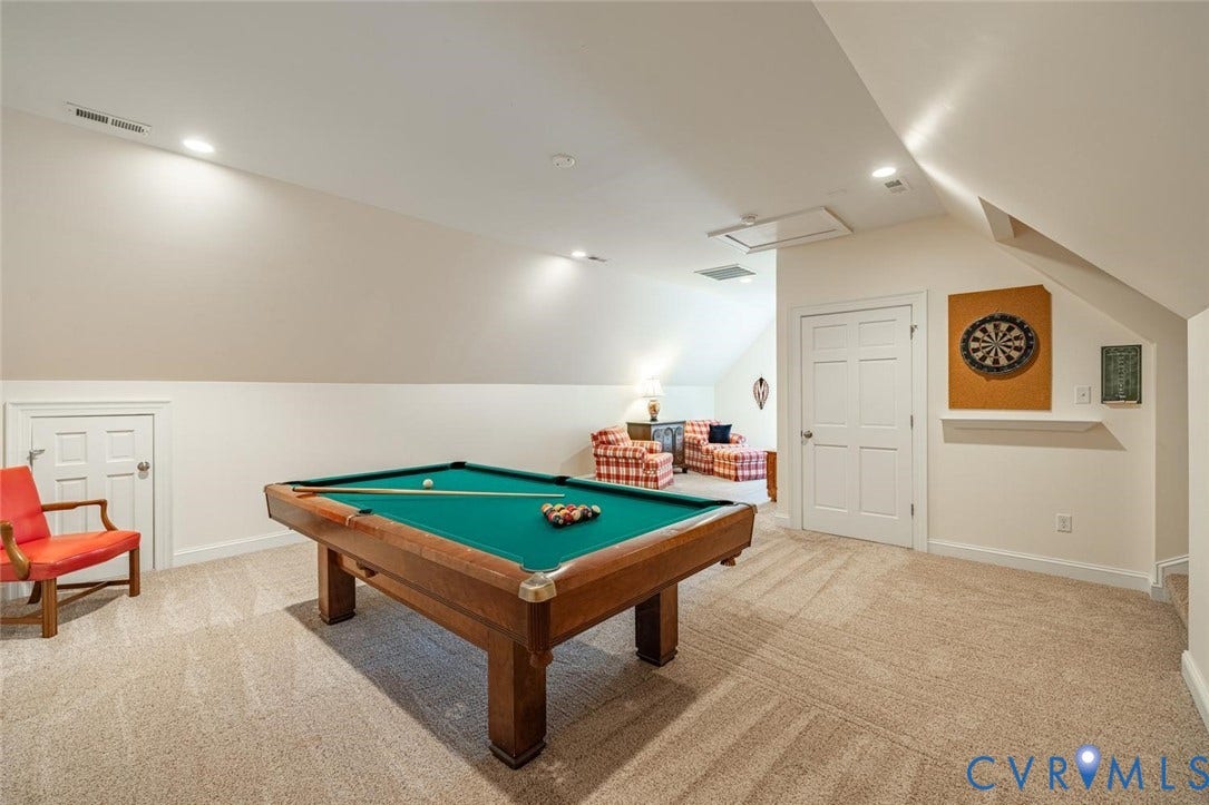 Pool table, TV area make this room fun!