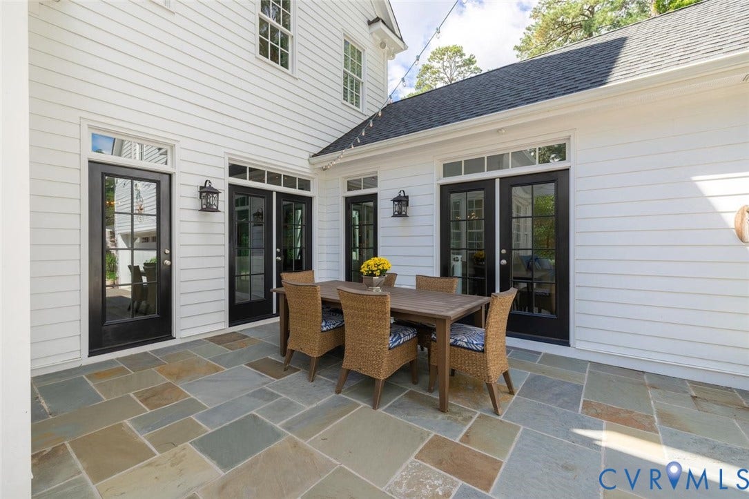 Dining area on patio and access to the living room and garage mudroom