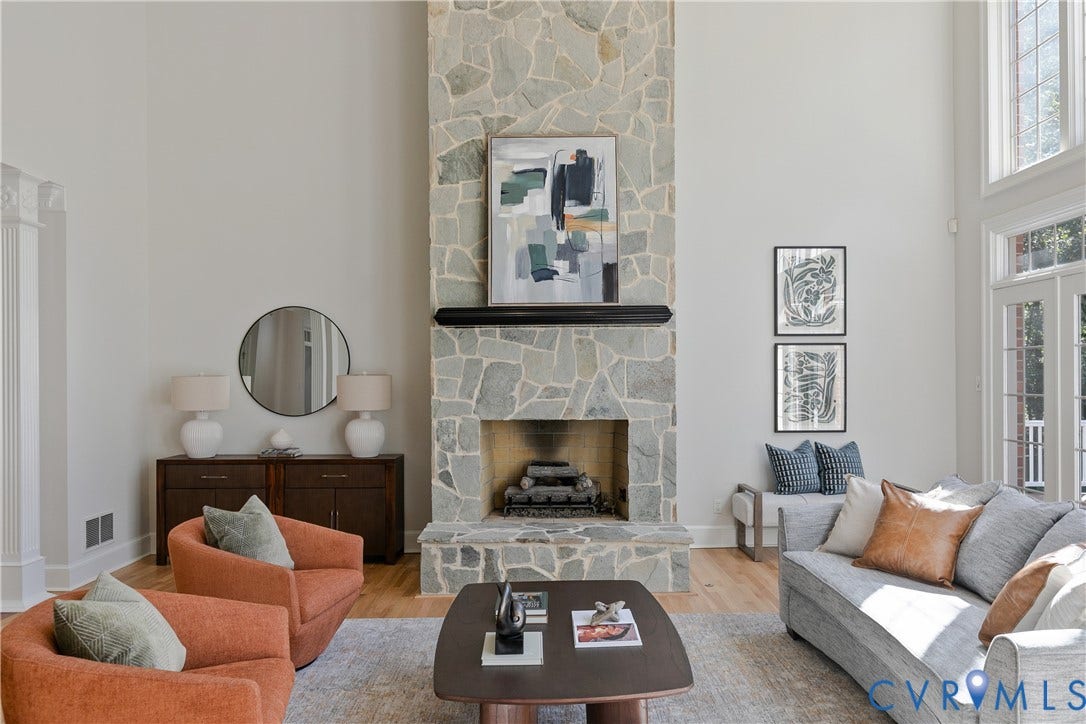 2621 Glenalmond Court, Powhatan, VA 23139 Stone-clad fireplace with mantel, high ceilings, wood-finish flooring, and French doors
