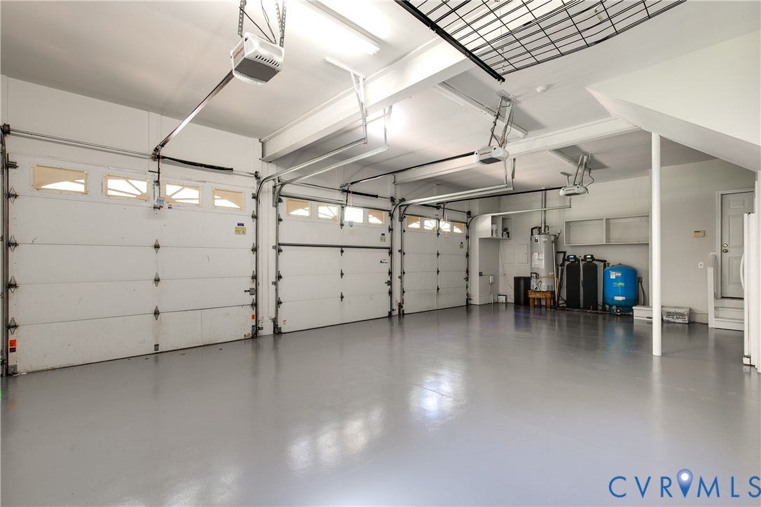 2621 Glenalmond Court, Powhatan, VA 23139 Three-car garage with overhead door openers and a finished floor