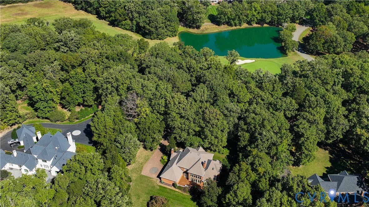 2621 Glenalmond Court, Powhatan, VA 23139 Expansive wooded surroundings with a private lake and golf course access