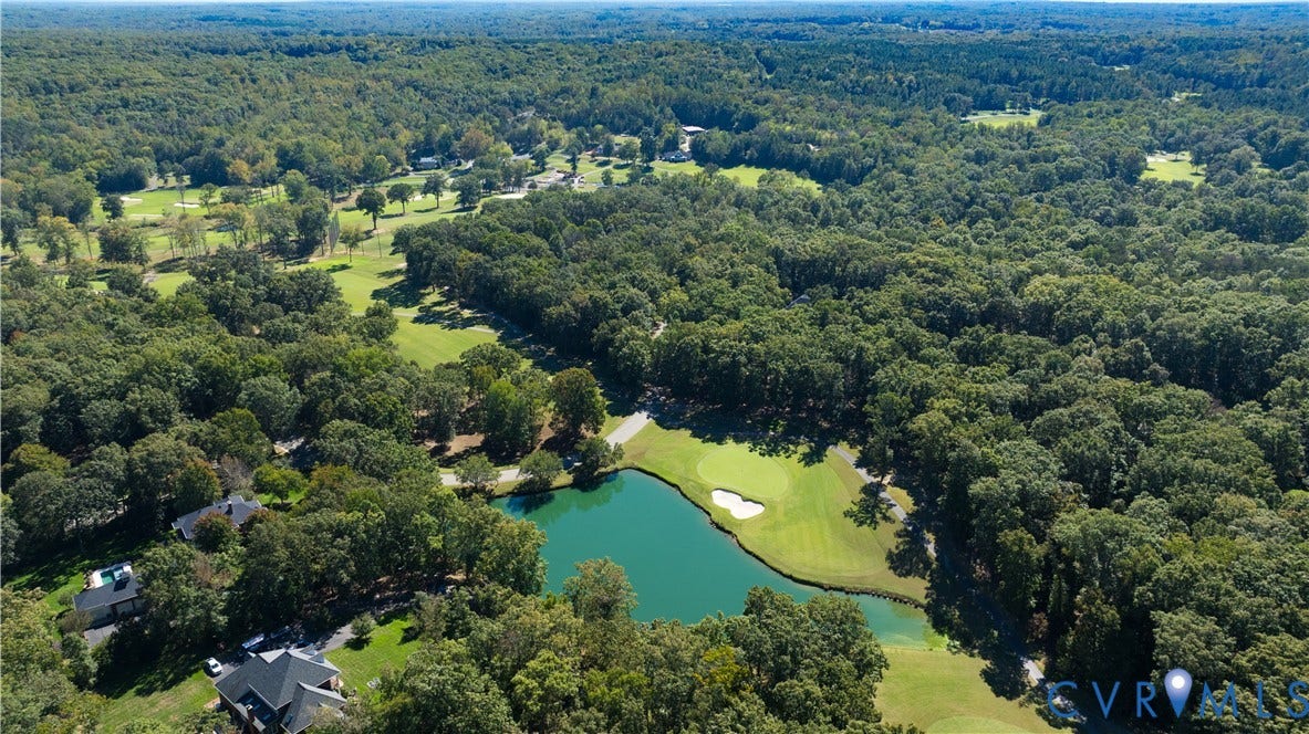 2621 Glenalmond Court, Powhatan, VA 23139 Expansive treed landscape with a significant pond and golf course fairways