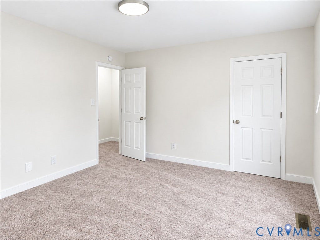 4609 Coldstream Drive, Richmond, VA 23234 Plush carpeting, neutral wall tones, white trim, flat panel ceiling light fixture, and white interior doors